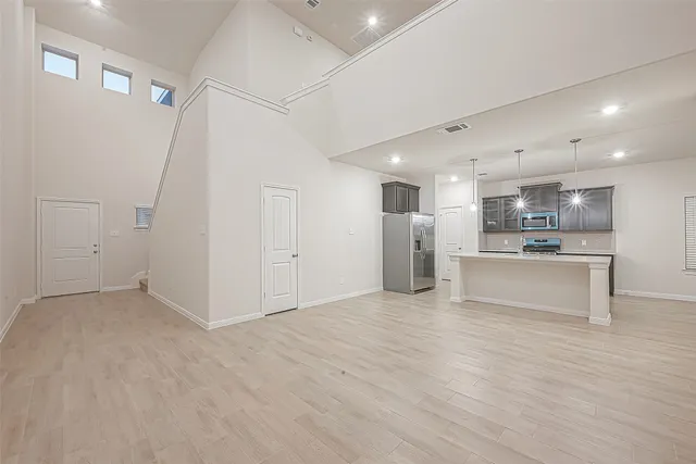 a view of kitchen with wooden floor