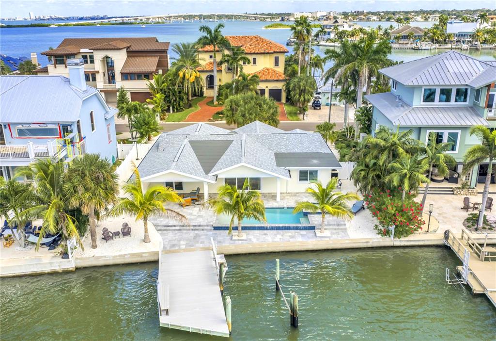 315 Harbor Drive Indian Rocks Beach, FL 33785 - Photo 1 of 1 a view of a house with outdoor space and a lake view