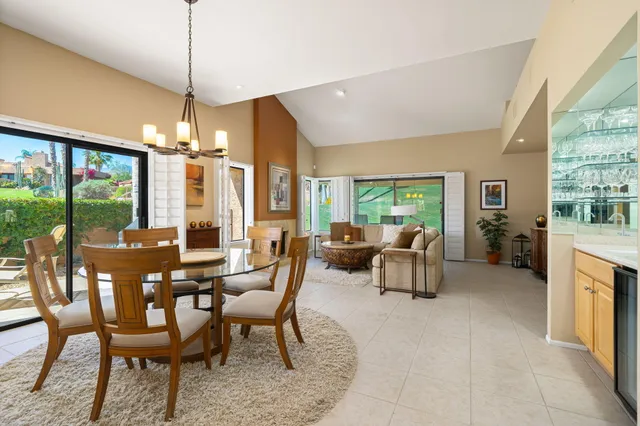 a kitchen with a stove and a refrigerator