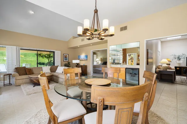 a kitchen with a sink appliances and cabinets