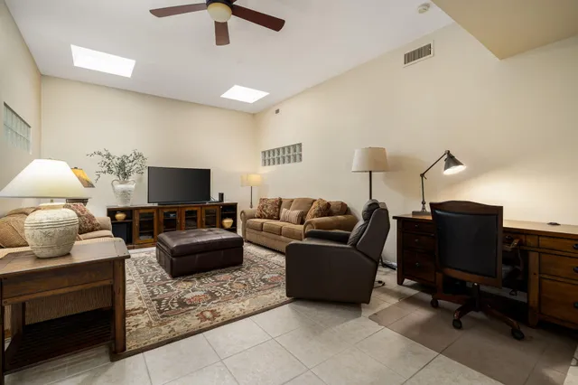 a bathroom with a sink double vanity and a mirror