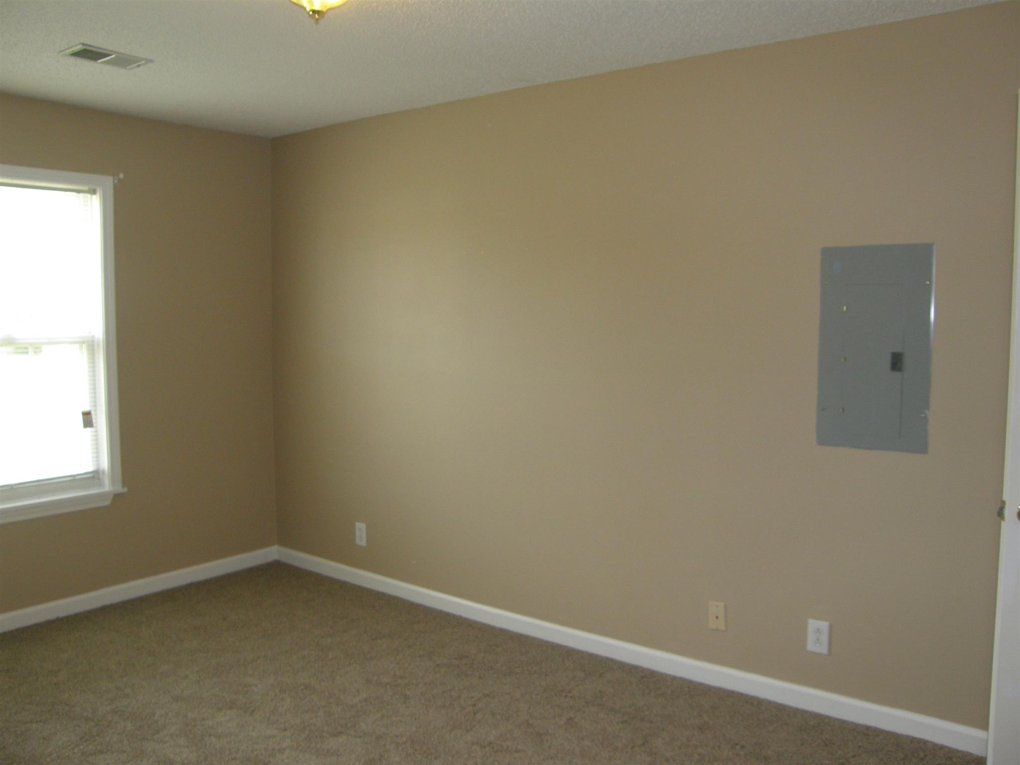 1051 Shadow Ridge Avenue Oak Grove, KY 42262 - Photo 14 of 20 an empty room with a window
