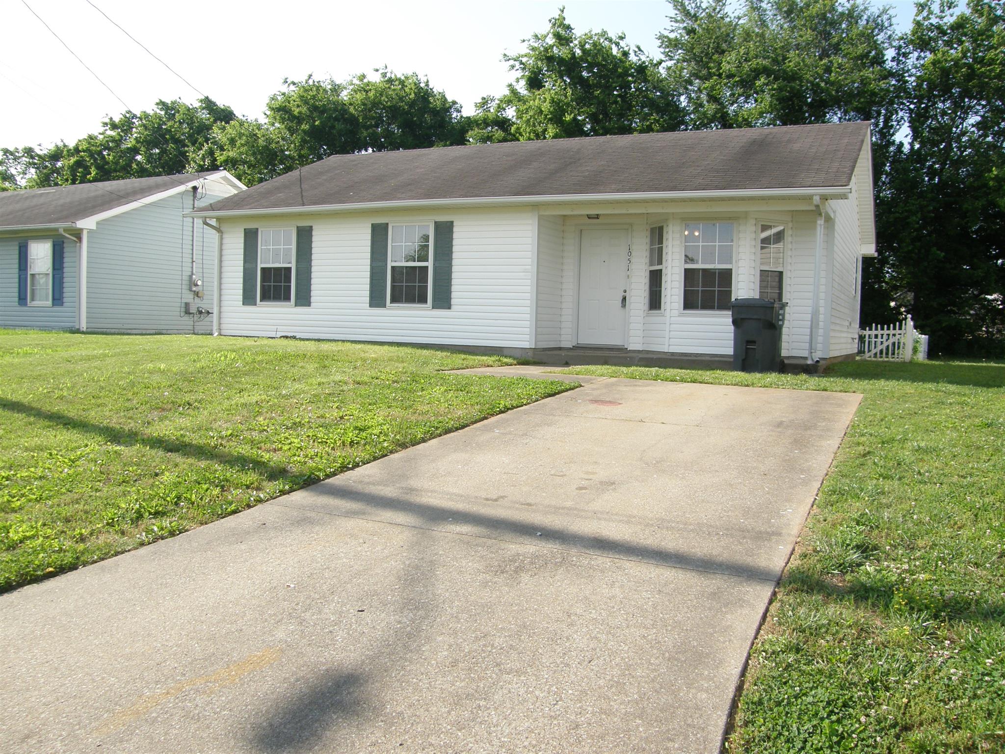 1051 Shadow Ridge Avenue Oak Grove, KY 42262 - Photo 2 of 20 a view of an house with backyard and garden