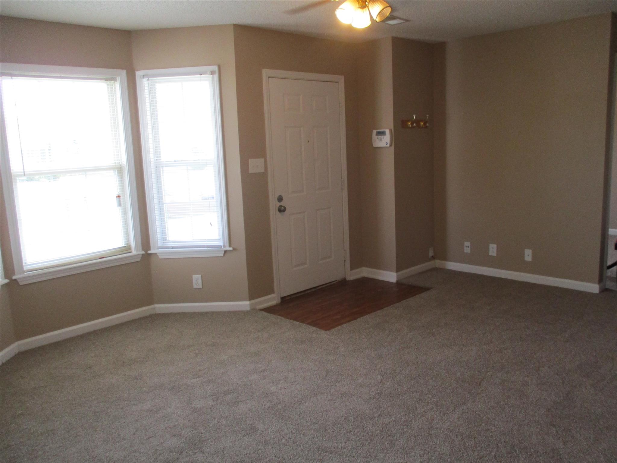 1051 Shadow Ridge Avenue Oak Grove, KY 42262 - Photo 4 of 20 an empty room with windows and closet