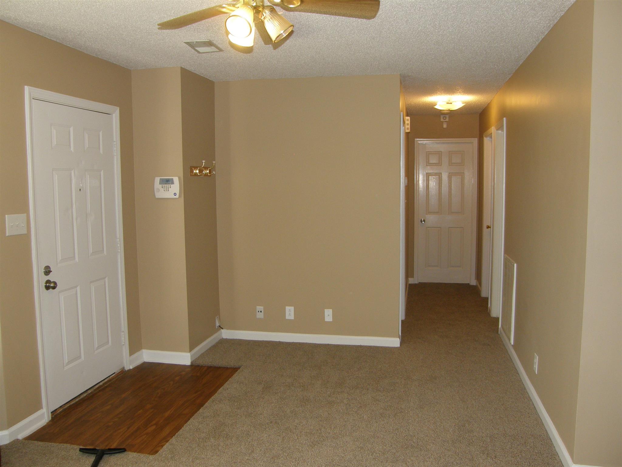 1051 Shadow Ridge Avenue Oak Grove, KY 42262 - Photo 6 of 20 a view of an empty room with a mirror