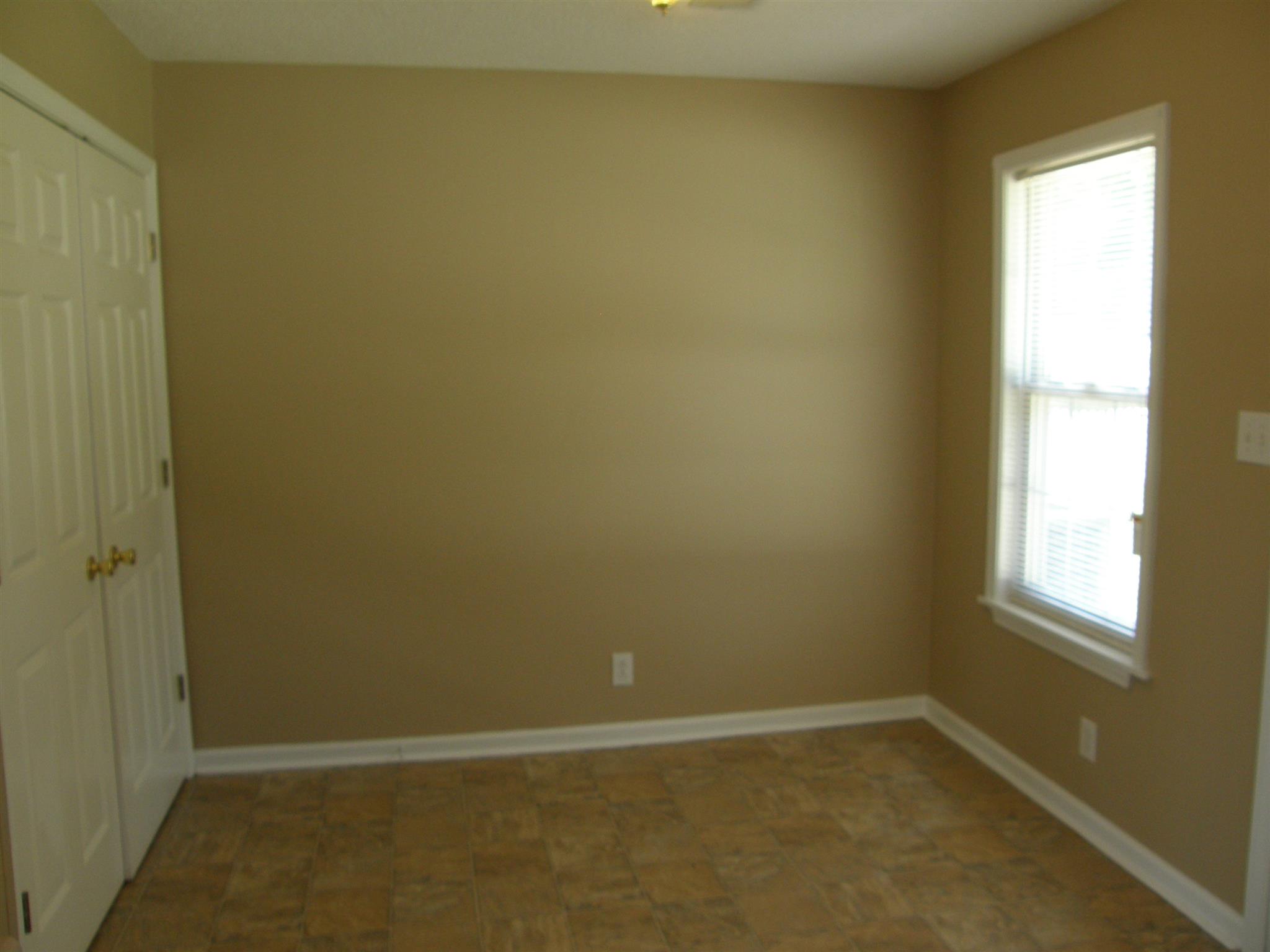 1051 Shadow Ridge Avenue Oak Grove, KY 42262 - Photo 9 of 20 an empty room with a window
