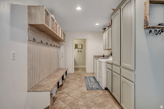 3054 West Ridgeline Road Stockton, UT 84071 - Photo 46 of 88 Laundry room with cabinet space, recessed lighting, washing machine and clothes dryer, and light tile patterned floors