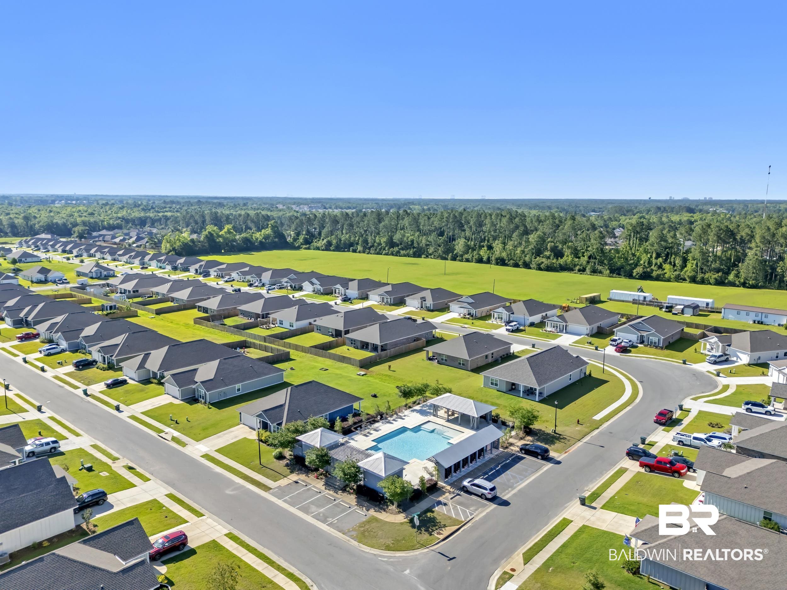 1228 Caper Avenue Foley, AL 36535 - Photo 40 of 54 Aerial perspective showcasing a residential community with uniform single-story homes