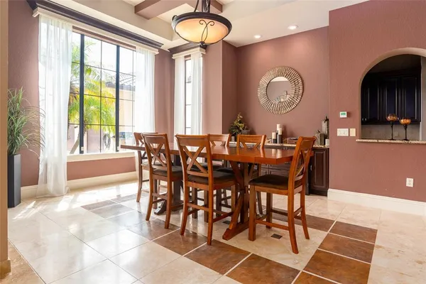 a kitchen with stainless steel appliances granite countertop a stove and a sink