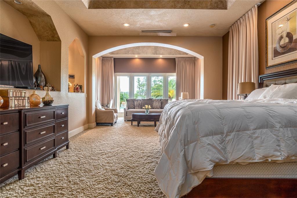 5251 Carson Street St. Cloud, FL 34771 - Photo 30 of 60 a bed room with a bed and a television