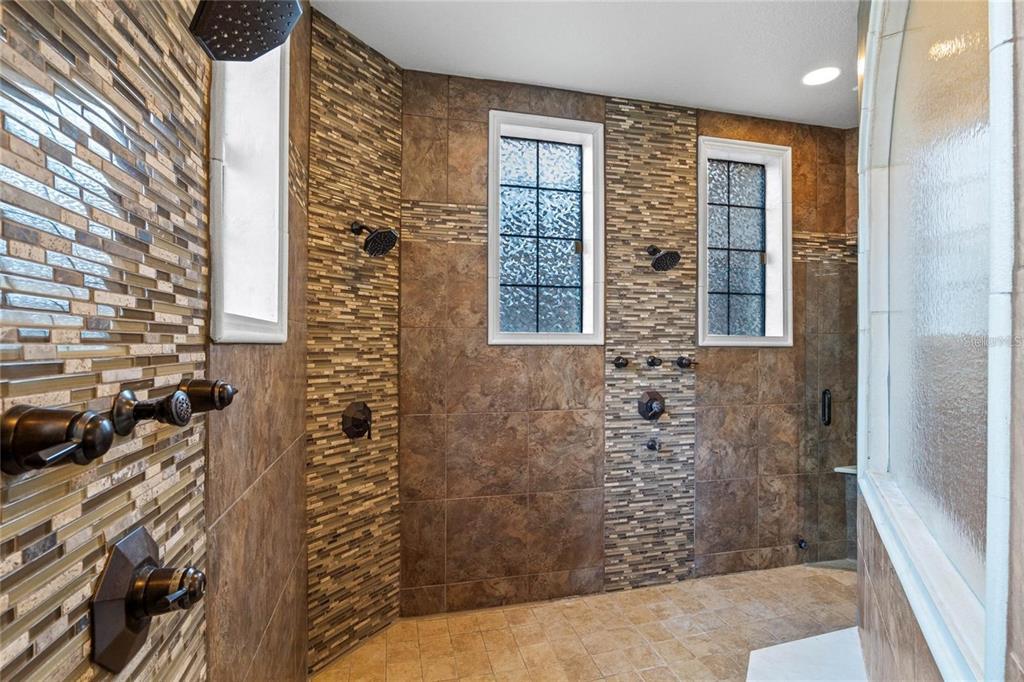 5251 Carson Street St. Cloud, FL 34771 - Photo 34 of 60 a bathroom with a shower