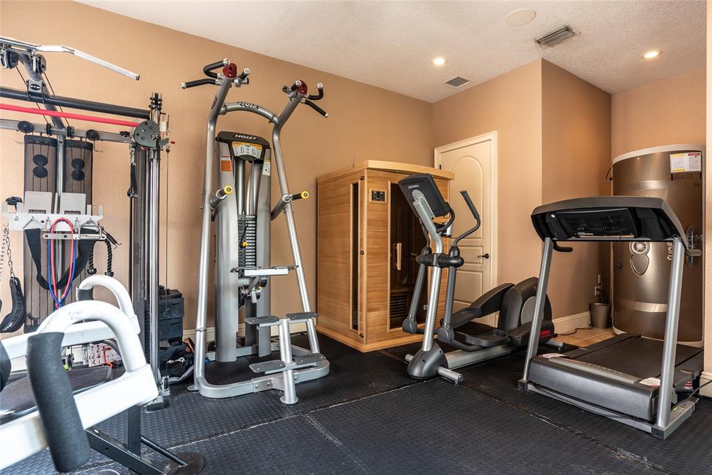 5251 Carson Street St. Cloud, FL 34771 - Photo 36 of 60 a view of a room with gym equipment