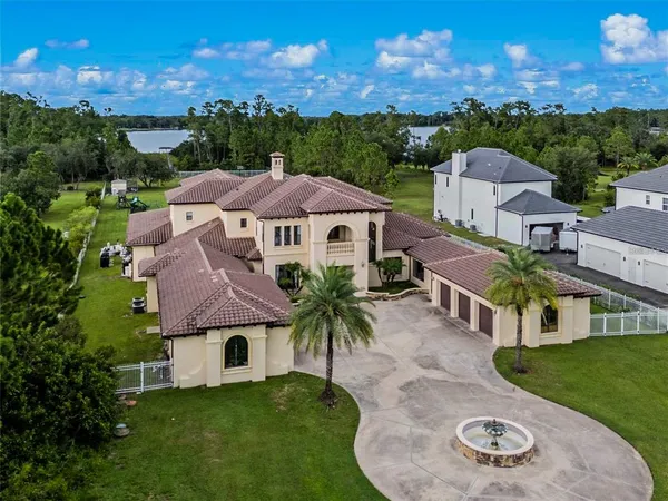 an aerial view of a house with a garden