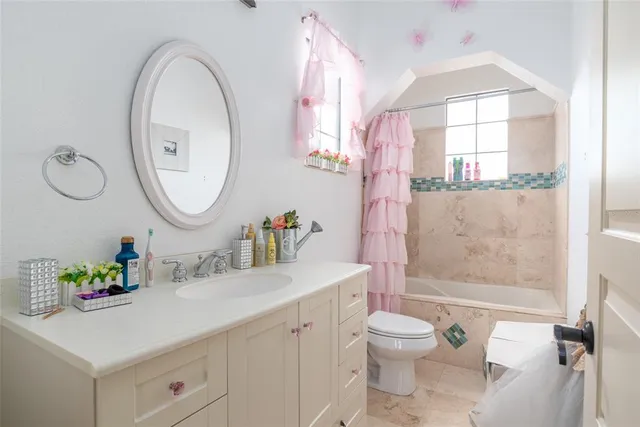 a view of a golf course with a lake