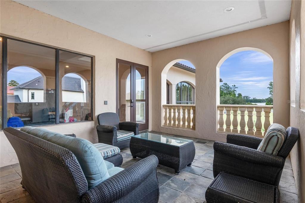 5251 Carson Street St. Cloud, FL 34771 - Photo 53 of 60 a living room with furniture and a large window