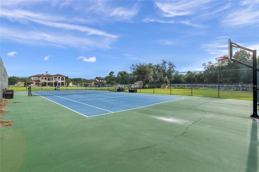 5251 Carson Street St. Cloud, FL 34771 - Photo 57 of 60 a view of an outdoor space and tennis court