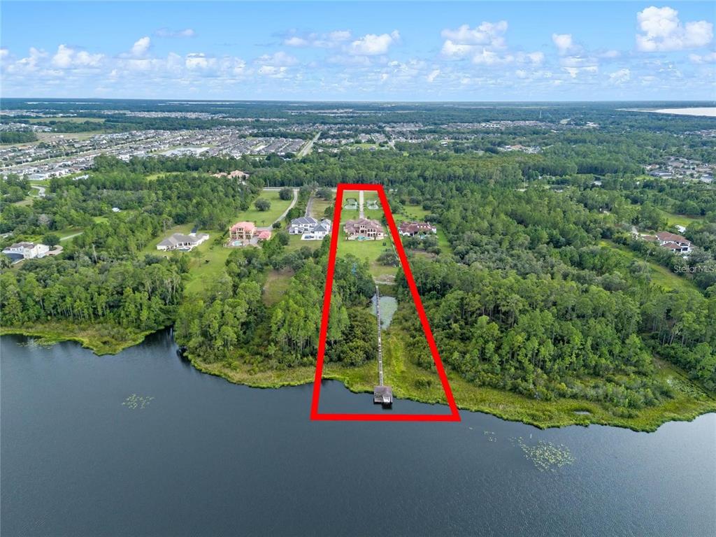 5251 Carson Street St. Cloud, FL 34771 - Photo 60 of 60 a view of a field with an outdoor space