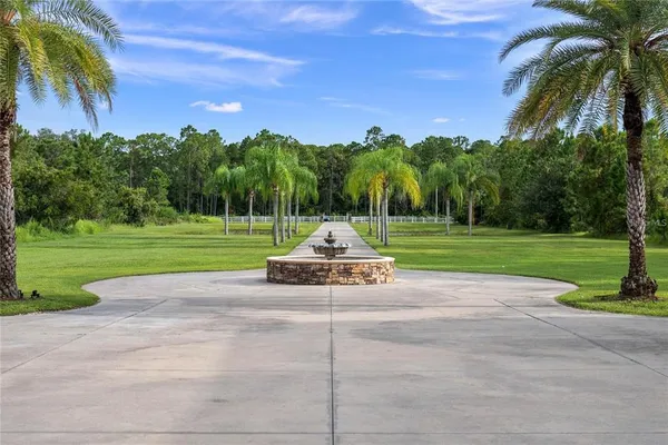 a view of a lake with a yard