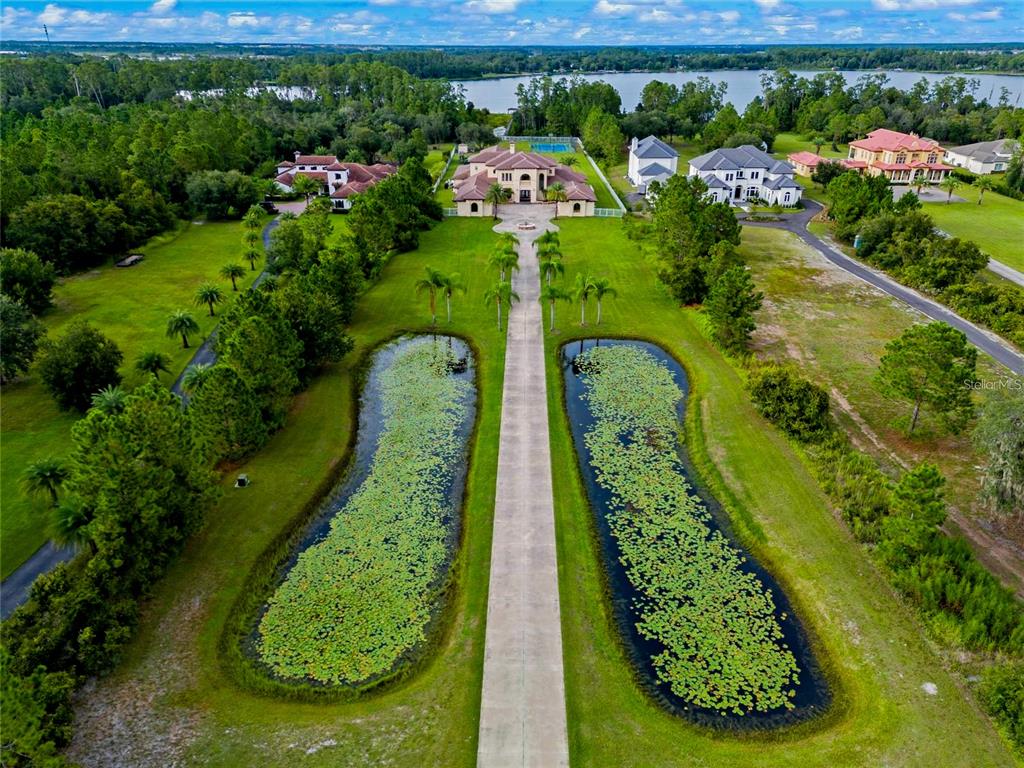 5251 Carson Street St. Cloud, FL 34771 - Photo 8 of 60 an aerial view of a residential houses with outdoor space and street view