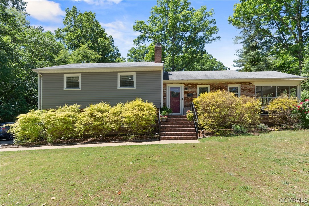 5018 Grassmere Road Richmond, VA 23234 - Photo 1 of 34 Tri-level home with a front yard and a chimney