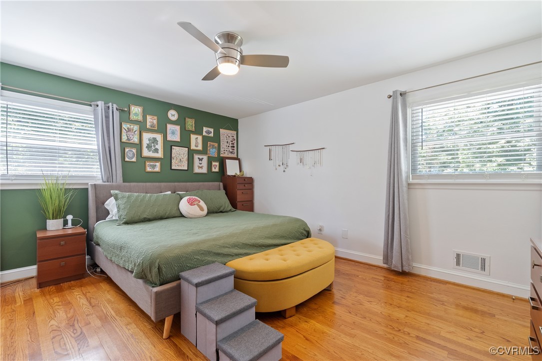 5018 Grassmere Road Richmond, VA 23234 - Photo 14 of 34 Bedroom featuring light wood finished floors, a ce