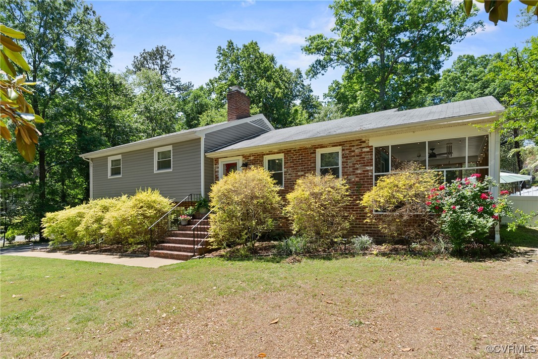5018 Grassmere Road Richmond, VA 23234 - Photo 2 of 34 View of front of property featuring a front lawn,