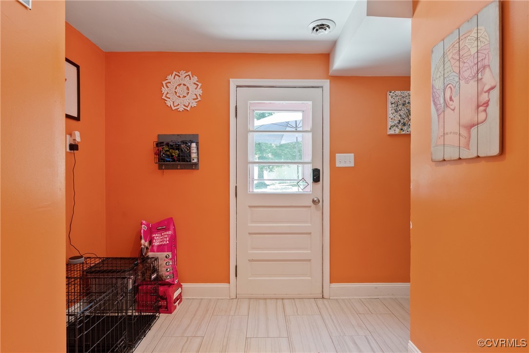 5018 Grassmere Road Richmond, VA 23234 - Photo 21 of 34 Doorway featuring baseboards