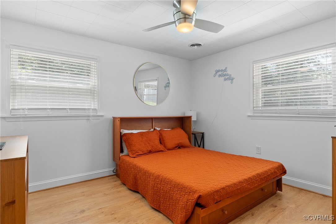 5018 Grassmere Road Richmond, VA 23234 - Photo 24 of 34 Bedroom with multiple windows, light wood finished