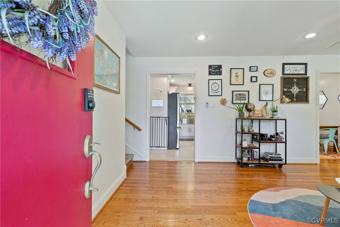 5018 Grassmere Road Richmond, VA 23234 - Photo 3 of 34 Foyer featuring wood finished floors, stairs, rece