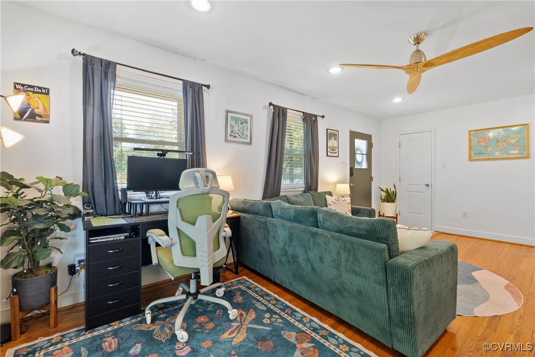 5018 Grassmere Road Richmond, VA 23234 - Photo 6 of 34 Living area featuring wood finished floors, ceilin
