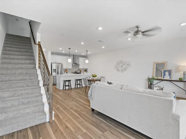 a living room with furniture and a table