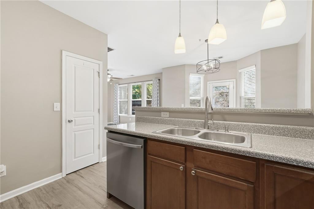 331 Oakview Way Canton, GA 30114 - Photo 11 of 42 a bathroom with a sink and a mirror