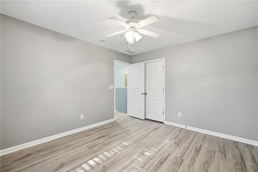 331 Oakview Way Canton, GA 30114 - Photo 23 of 42 wooden floor in an empty room