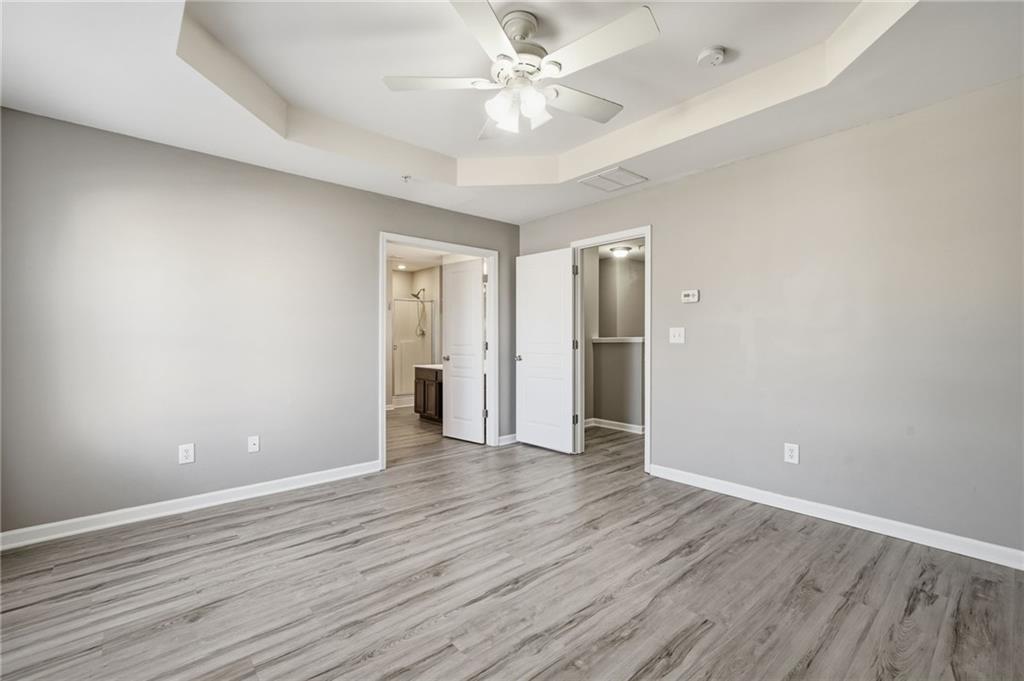 331 Oakview Way Canton, GA 30114 - Photo 30 of 42 a view of an empty room with wooden floor