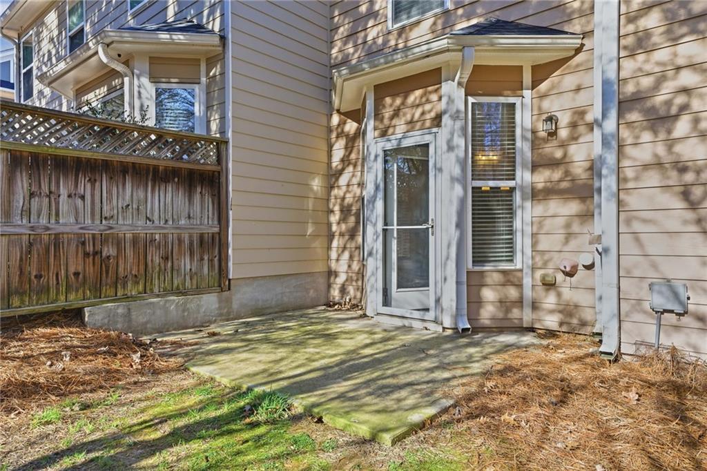 331 Oakview Way Canton, GA 30114 - Photo 37 of 42 a view of a brick house with large windows
