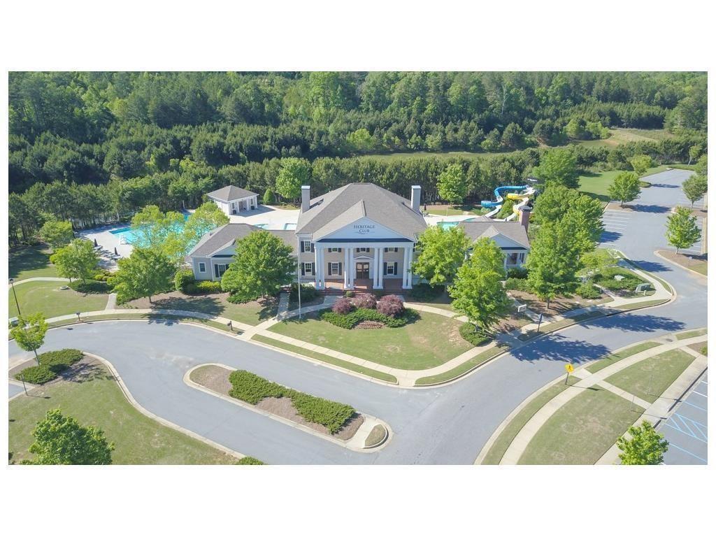 331 Oakview Way Canton, GA 30114 - Photo 41 of 42 a swimming pool with outdoor seating and yard