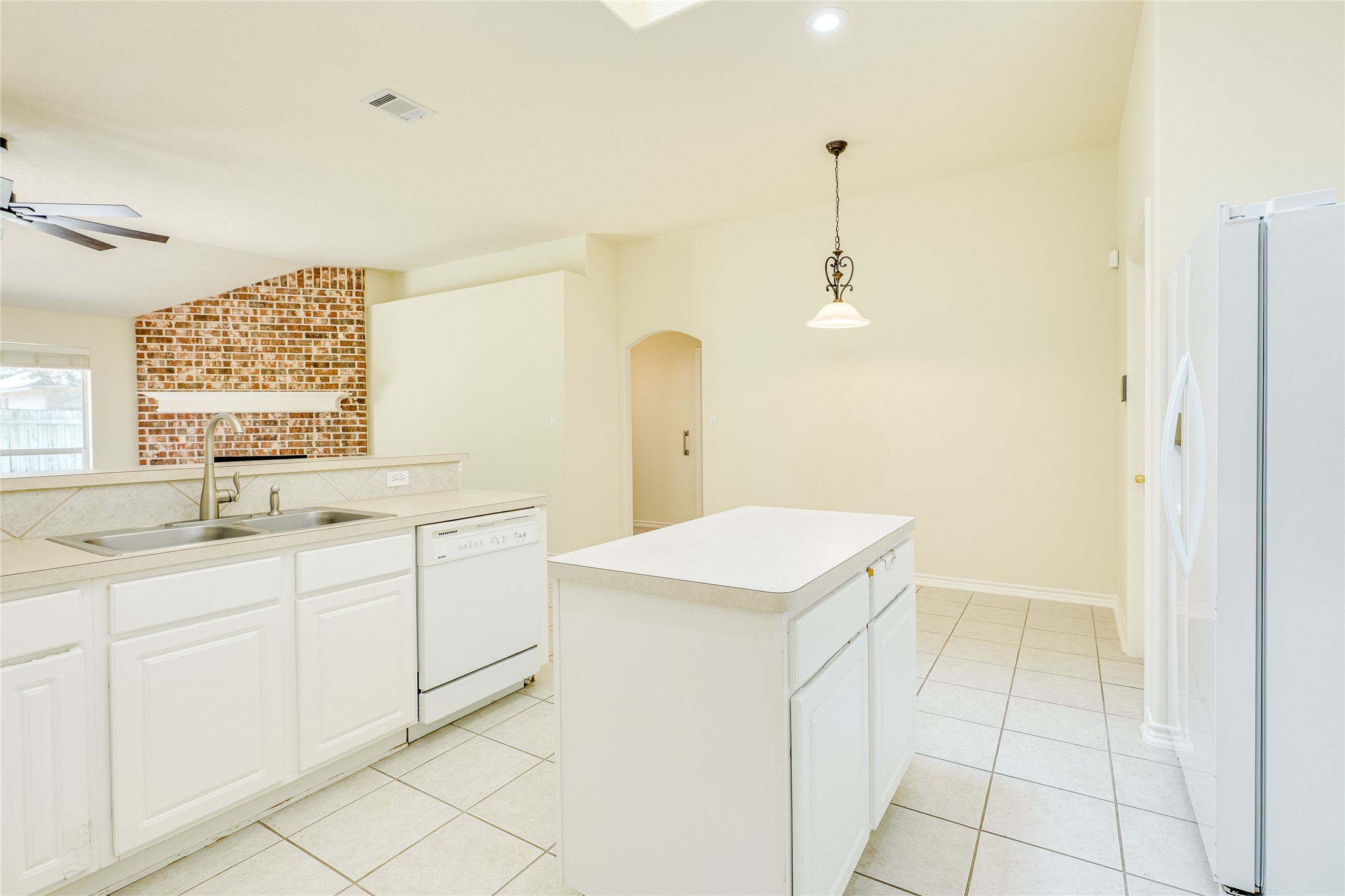 111 Arrowhead Lane Georgetown, TX 78628 - Photo 21 of 40 a bathroom with a sink a vanity and a mirror