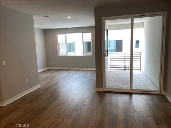a kitchen with white cabinets and a sink