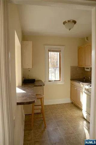 a workspace with furniture and window