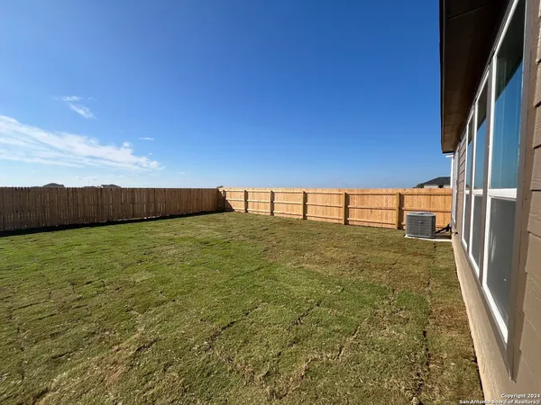 a view of an outdoor space and a yard