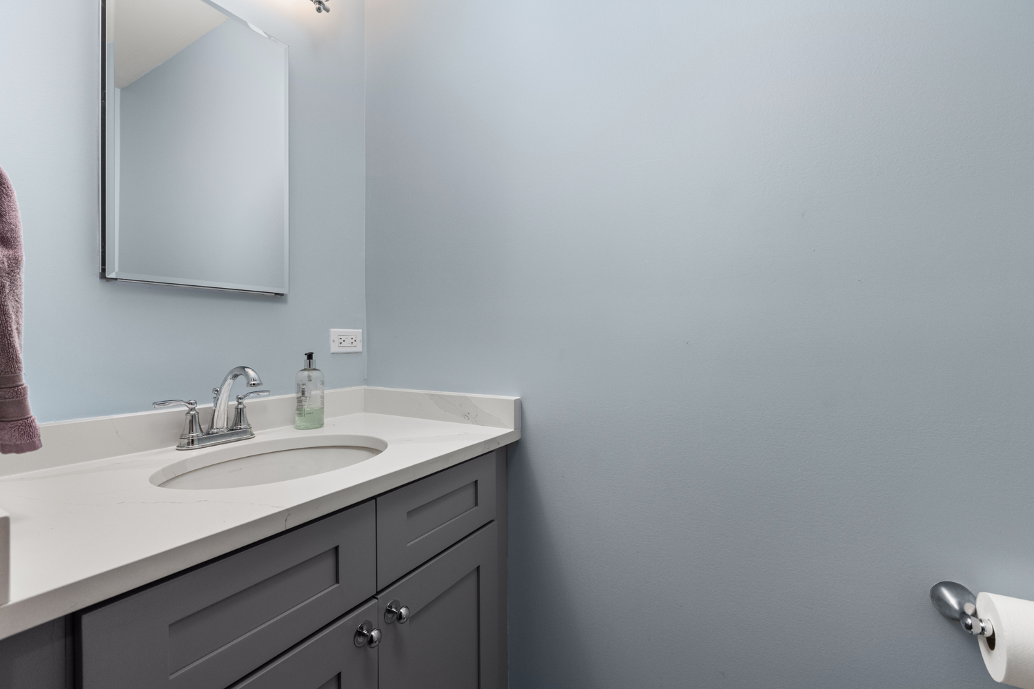 1029 Washington Boulevard, Unit 102 Oak Park, IL 60302 - Photo 19 of 24 a bathroom with a sink and a mirror