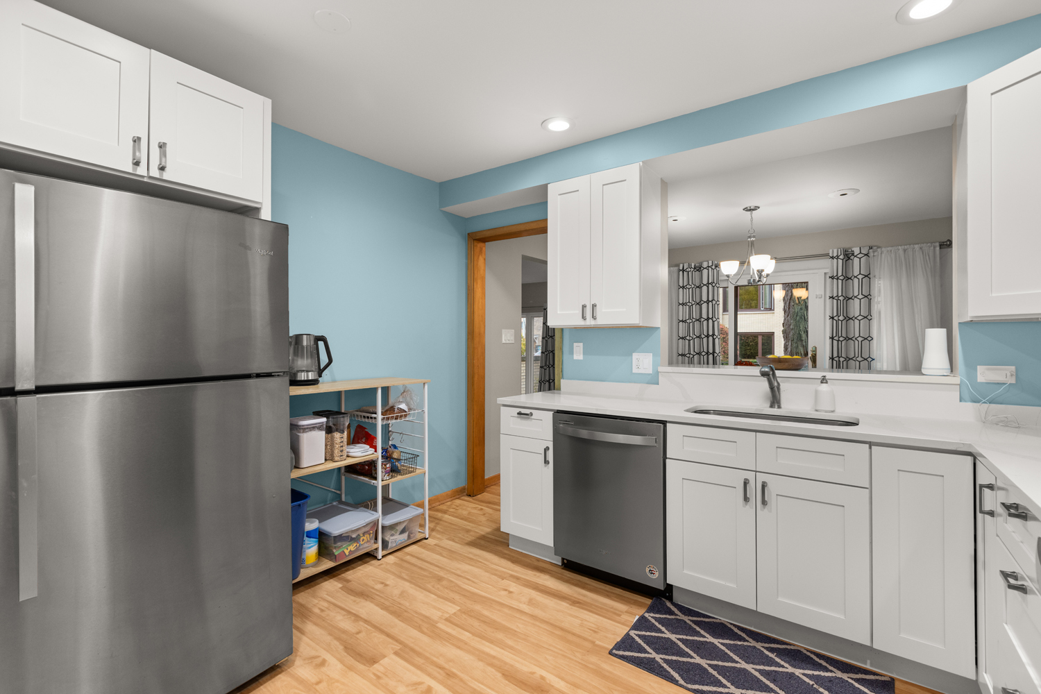 1029 Washington Boulevard, Unit 102 Oak Park, IL 60302 - Photo 8 of 24 a kitchen with a refrigerator and a sink