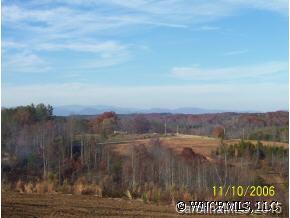 6 Will Green Road, Unit 6 Tryon, NC 28722 - Photo 3 of 4 a view of lake with mountain