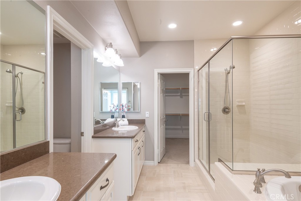 120 Mongoose Irvine, CA 92618 - Photo 13 of 42 a bathroom with a sink double vanity and tub