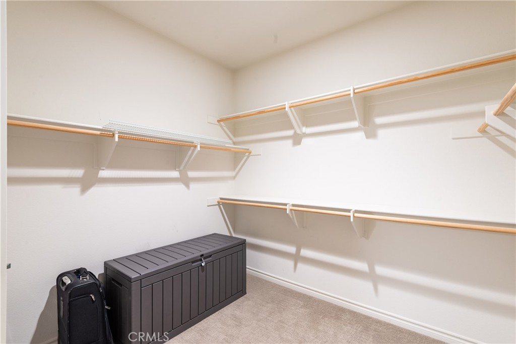 120 Mongoose Irvine, CA 92618 - Photo 16 of 42 a view of storage and utility room with racks on the wall