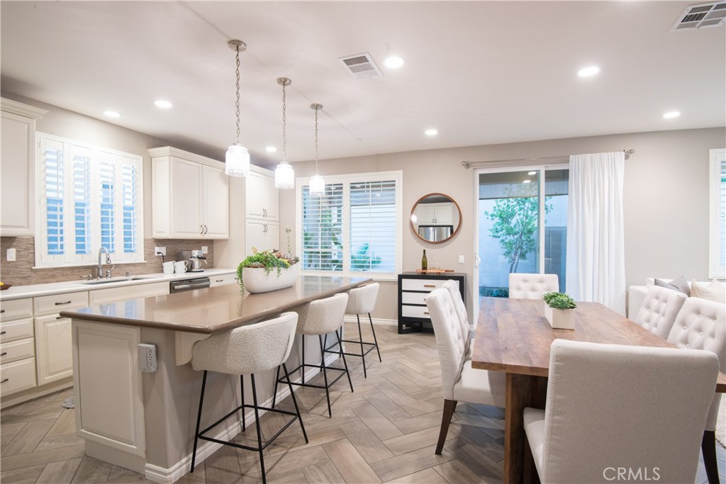 120 Mongoose Irvine, CA 92618 - Photo 2 of 42 a view of a dining room and livingroom with furniture window