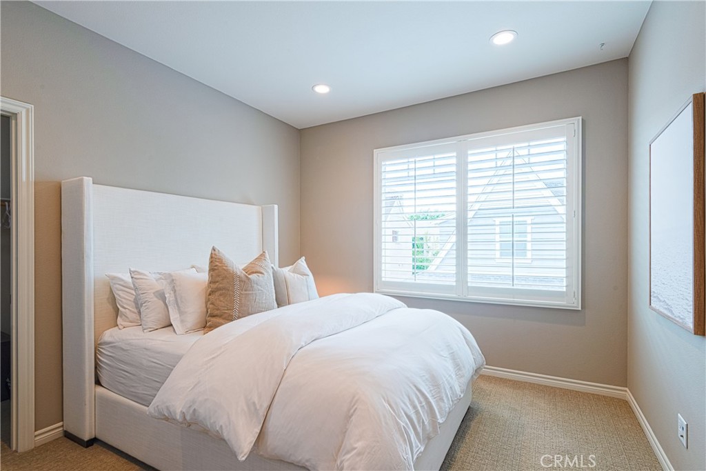 120 Mongoose Irvine, CA 92618 - Photo 21 of 42 a bedroom with a bed and a window