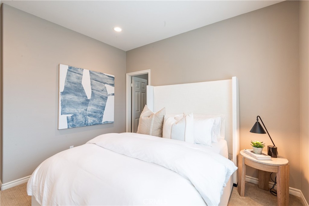 120 Mongoose Irvine, CA 92618 - Photo 22 of 42 a bedroom with a bed and a window