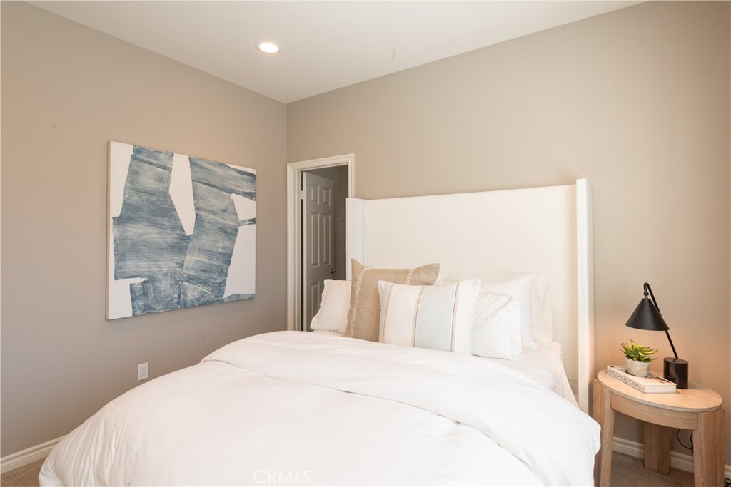 120 Mongoose Irvine, CA 92618 - Photo 25 of 42 a bedroom with a large bed and a window