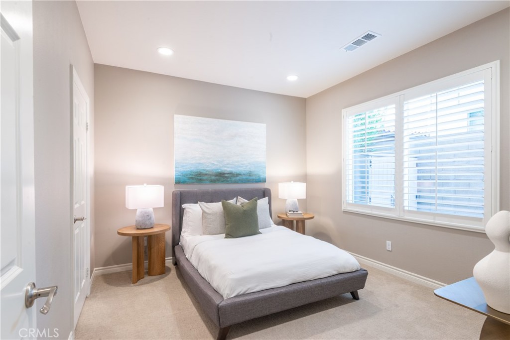 120 Mongoose Irvine, CA 92618 - Photo 26 of 42 a bedroom with a bed and a window